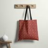 Stofftasche aus Schwarzwald Stoff mit Kuckucksuhr-Muster in Mono Rot.